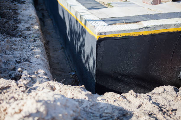 Professional Waterproofing technician working in Burr Oak, MI